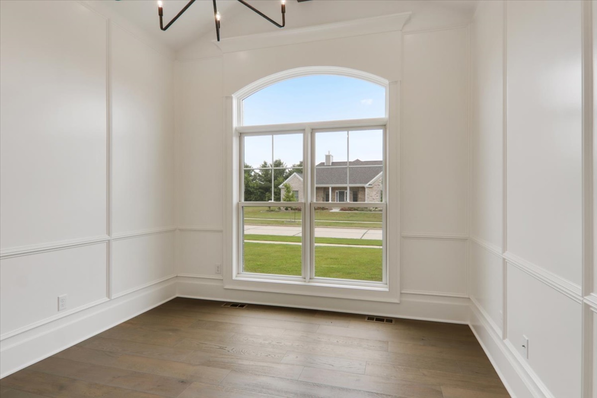 604 Cayman Way Savoy, IL 61874 - Photo 7 of 82 an empty room with window