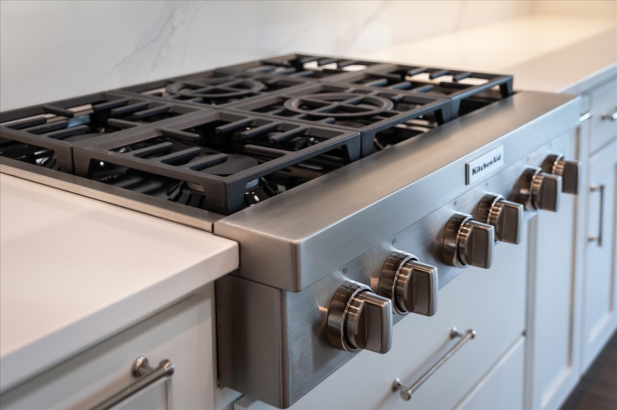 604 Cayman Way Savoy, IL 61874 - Photo 77 of 82 a close up of a stove top oven sitting inside of a kitchen