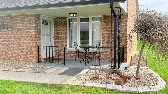 3361 Turner Drive Springfield, OH 45504 - Photo 2 of 18 This charming residence features a classic brick exterior and a welcoming front porch perfect for relaxation.