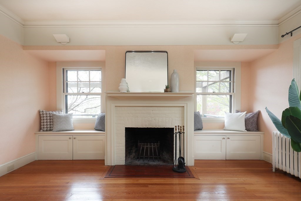 16 Percy Road Lexington, MA 02421 - Photo 13 of 31 a living room with furniture and a fireplace