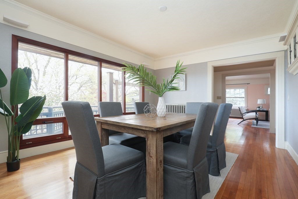 16 Percy Road Lexington, MA 02421 - Photo 15 of 31 a view of a dining room with furniture and wooden floor