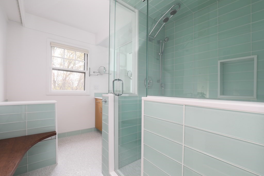 16 Percy Road Lexington, MA 02421 - Photo 29 of 31 a bathroom with a window and a shower