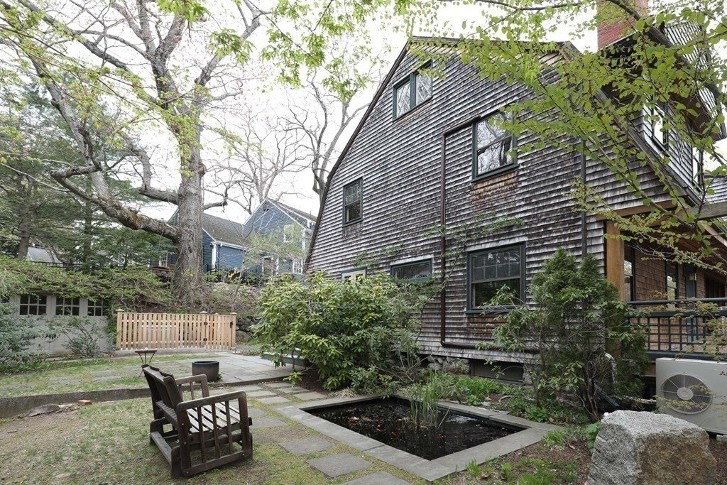 16 Percy Road Lexington, MA 02421 - Photo 5 of 31 a backyard of a house with lots of green space