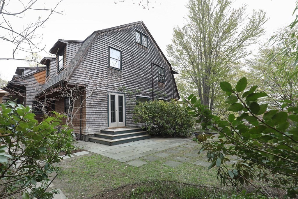 16 Percy Road Lexington, MA 02421 - Photo 7 of 31 a front view of a house with a yard
