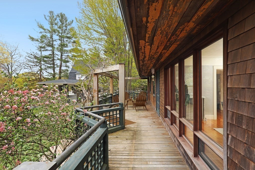 16 Percy Road Lexington, MA 02421 - Photo 8 of 31 a view of balcony with wooden floor and seating space