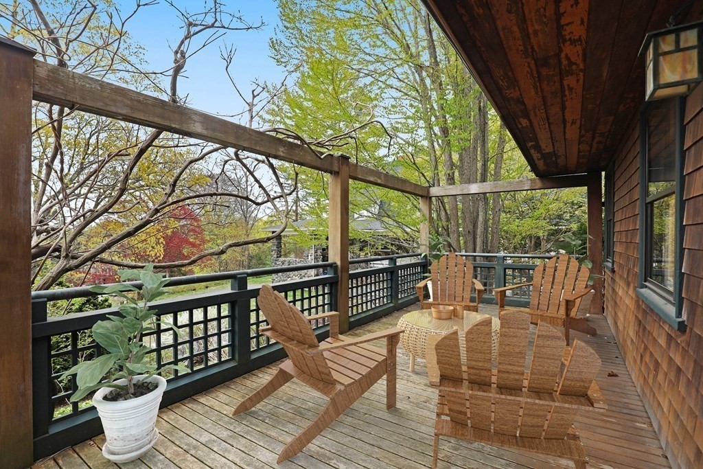 16 Percy Road Lexington, MA 02421 - Photo 9 of 31 a balcony with wooden floor and outdoor seating