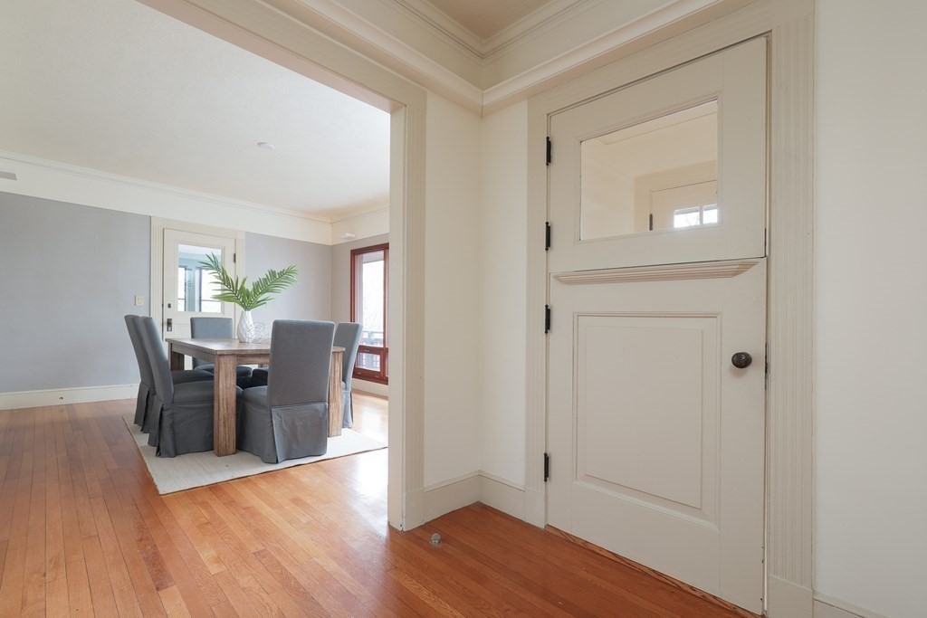 16 Percy Road Lexington, MA 02421 - Photo 10 of 31 a view of a dining room with furniture and wooden floor