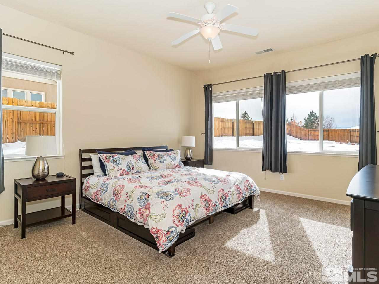 10175 Gold Mine Drive Reno, NV 89521 - Photo 11 of 24 a bedroom with a bed and window