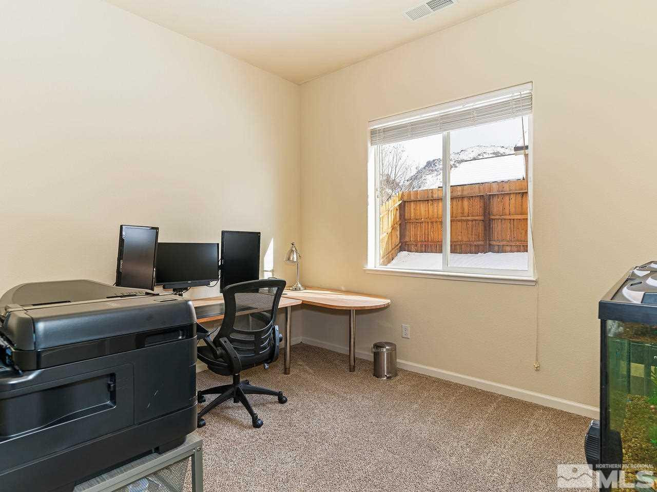 10175 Gold Mine Drive Reno, NV 89521 - Photo 15 of 24 a view of a workspace with a window