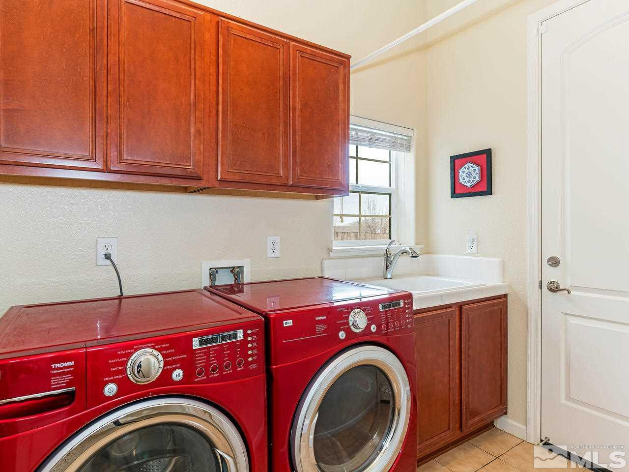 10175 Gold Mine Drive Reno, NV 89521 - Photo 17 of 24 a utility room with dryer and washer