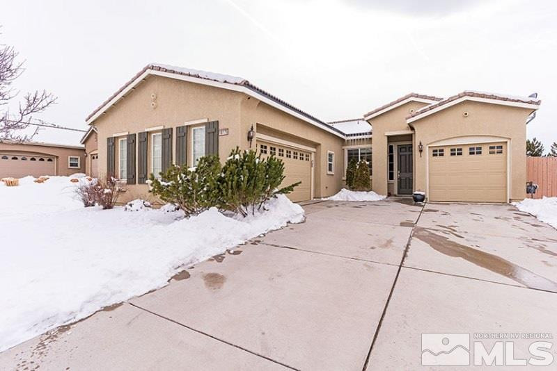 10175 Gold Mine Drive Reno, NV 89521 - Photo 2 of 24 a front view of a house with a yard
