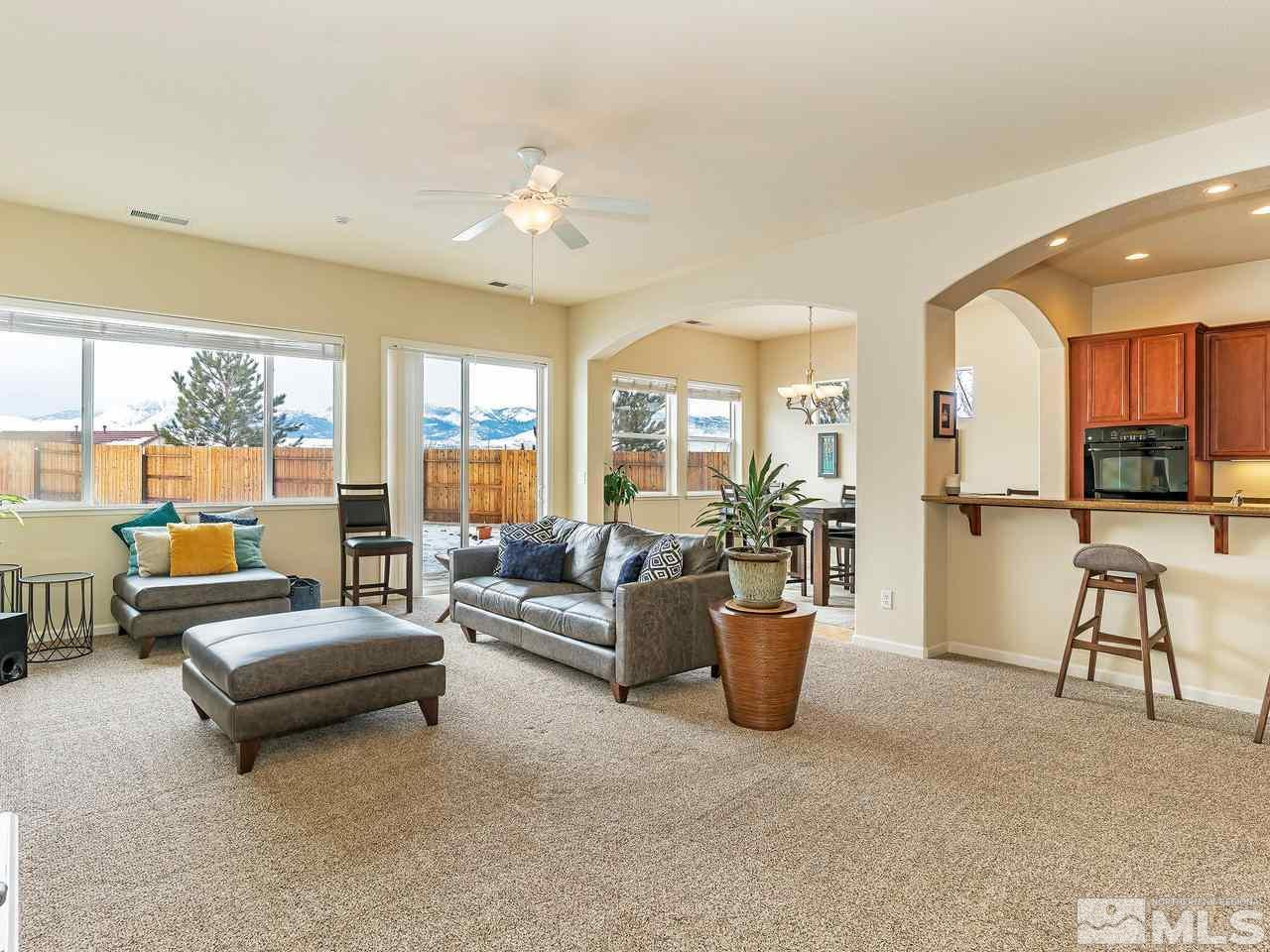 10175 Gold Mine Drive Reno, NV 89521 - Photo 3 of 24 a living room with furniture and a large window