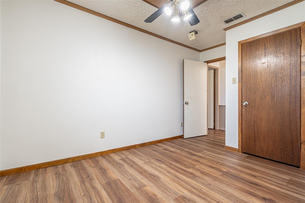 501 Endora Dublin, TX 76446 - Photo 28 of 39 wooden floor in an empty room