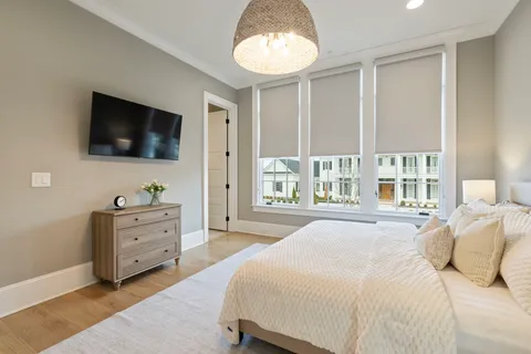 a kitchen with granite countertop a stove a sink and a microwave