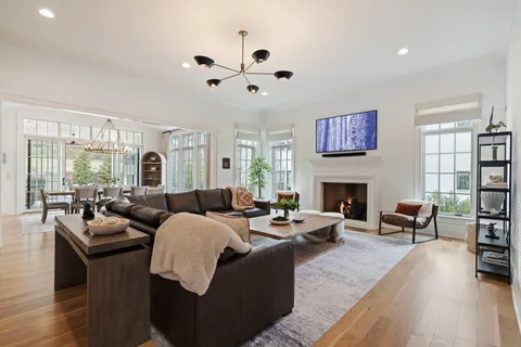 a kitchen with sink stove and cabinets