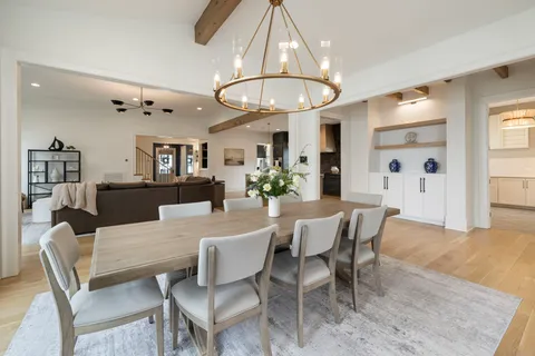 a bedroom with a bed and a black white wall