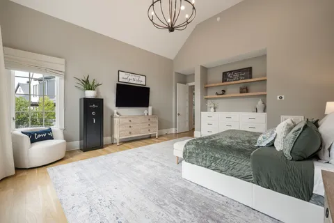 a view of a house with backyard porch and sitting area