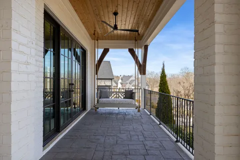 a view of a livingroom with furniture window and wooden floor