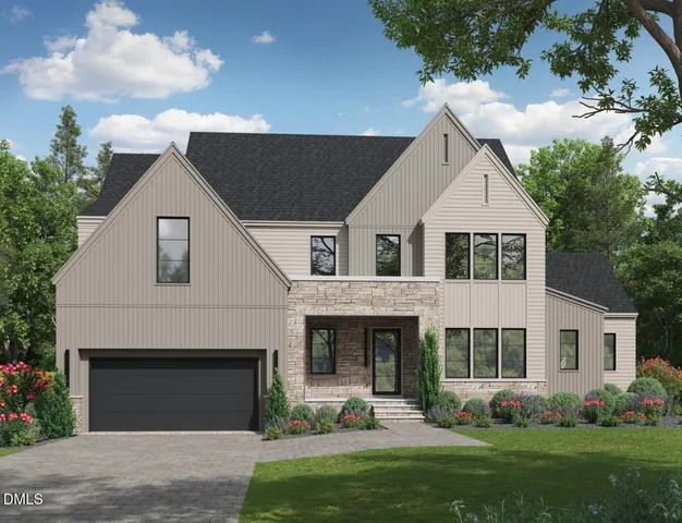 a front view of a house with a garden and plants