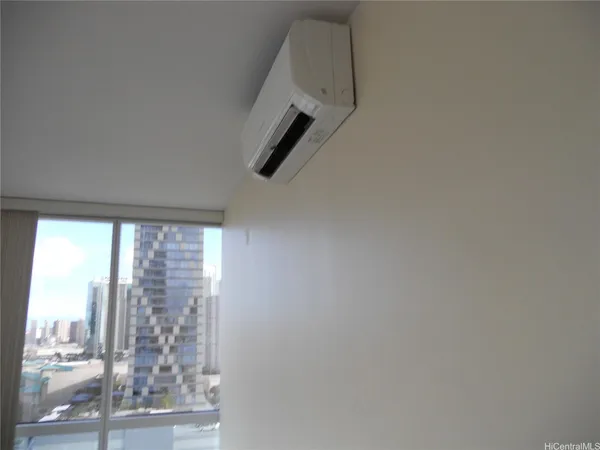 a bathroom with a large window and a shower