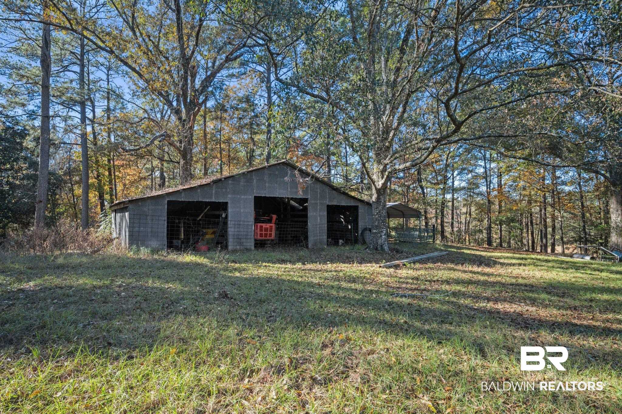 15801 Maytower Road Bay Minette, AL 36507 - Photo 37 of 43 View of outbuilding featuring a yard
