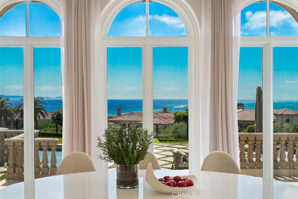 22 Pelican Crest Drive Newport Coast, CA 92657 - Photo 19 of 66 a dining room with furniture window and natural view