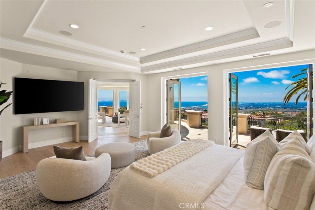 22 Pelican Crest Drive Newport Coast, CA 92657 - Photo 34 of 66 a living room with furniture and a flat screen tv