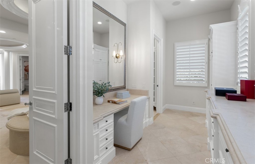 22 Pelican Crest Drive Newport Coast, CA 92657 - Photo 40 of 66 a bathroom with a tub sink and mirror