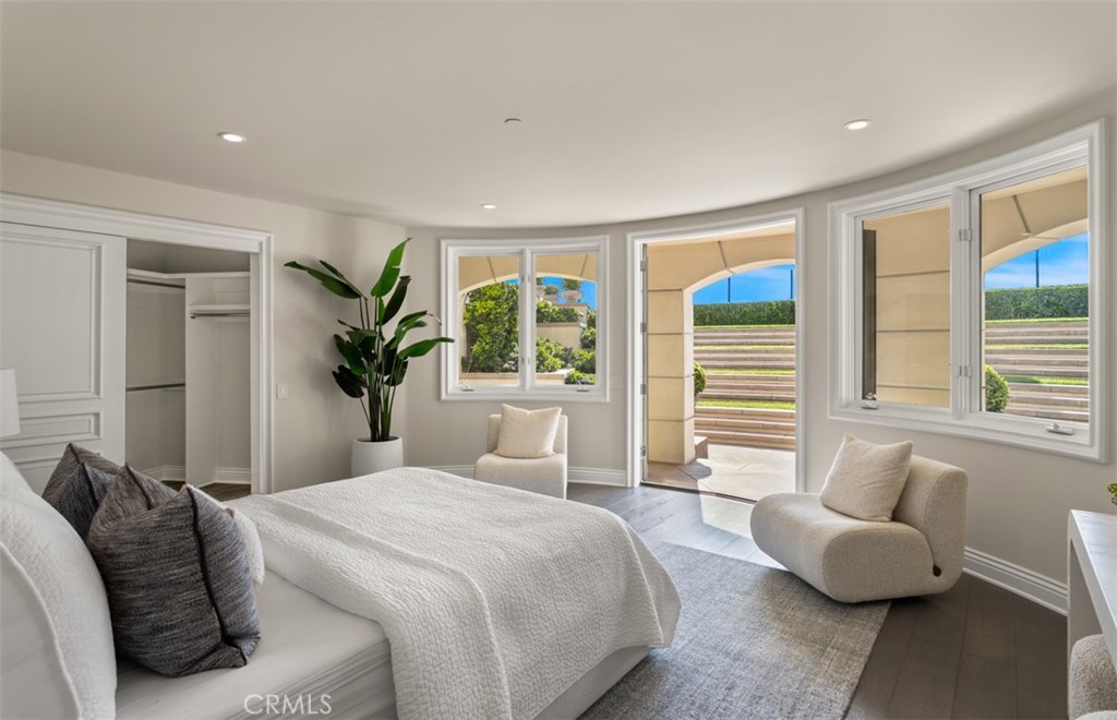 22 Pelican Crest Drive Newport Coast, CA 92657 - Photo 52 of 66 a bedroom with a large bed and a large window