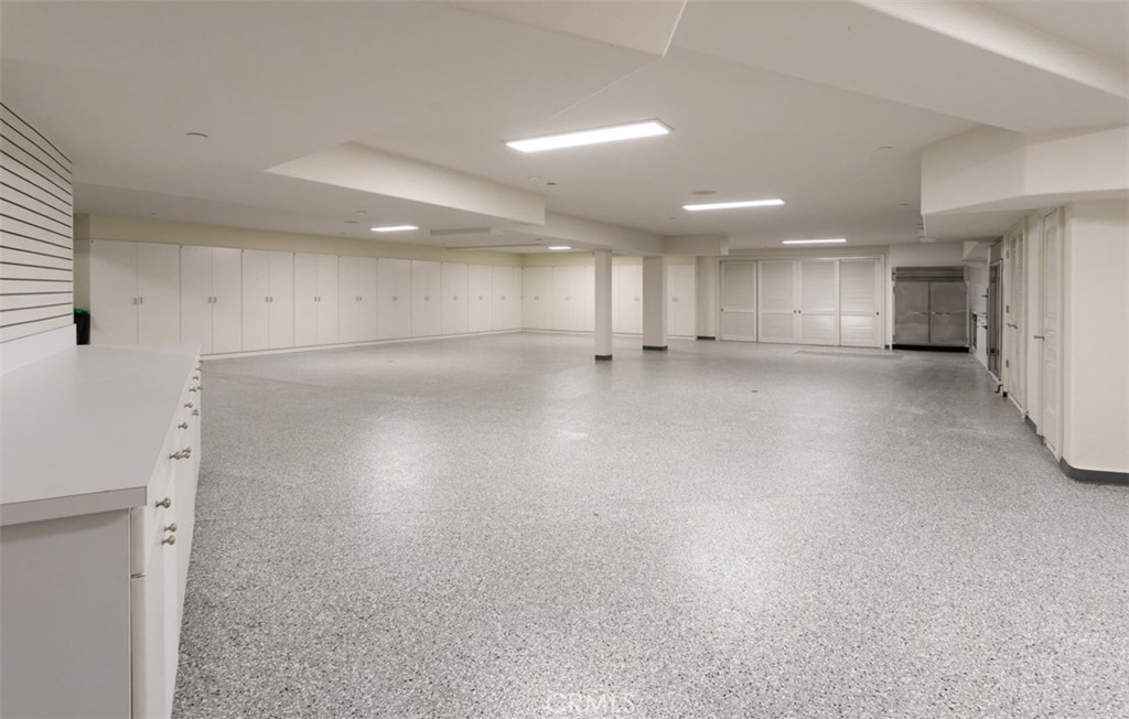 22 Pelican Crest Drive Newport Coast, CA 92657 - Photo 59 of 66 a view of a kitchen with a sink and a refrigerator