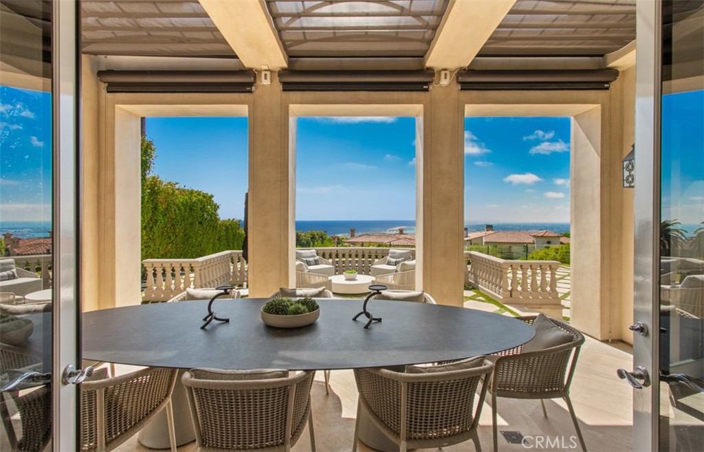 22 Pelican Crest Drive Newport Coast, CA 92657 - Photo 61 of 66 a view of a dining room with furniture window and outside view