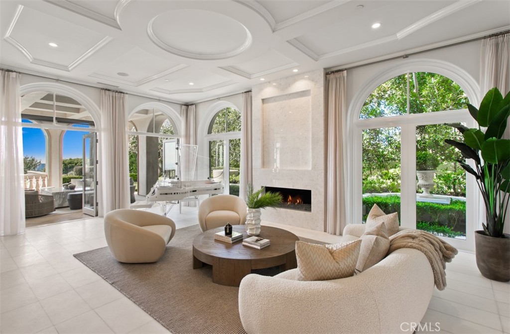 22 Pelican Crest Drive Newport Coast, CA 92657 - Photo 8 of 66 a living room with furniture and a large window