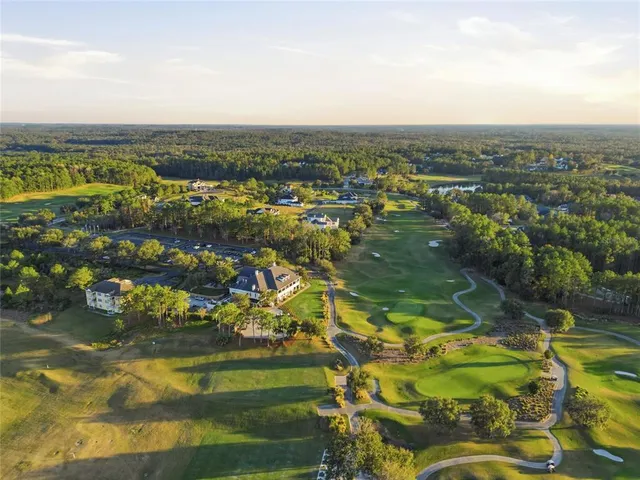 a view of a house with big yard