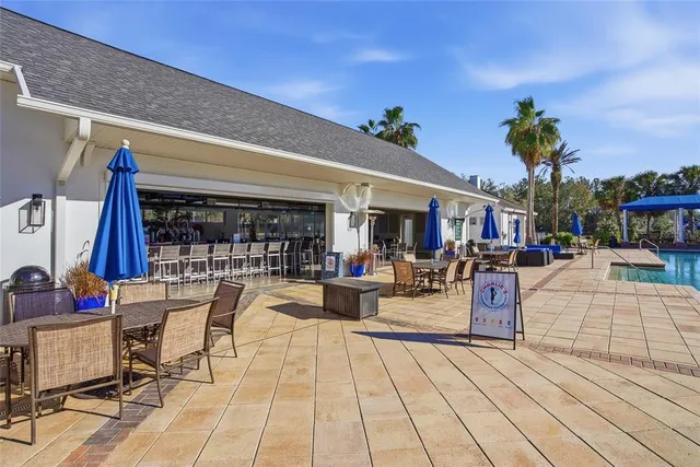 a view of a swimming pool with a patio
