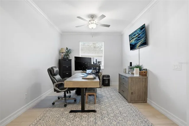 a workspace with furniture and window