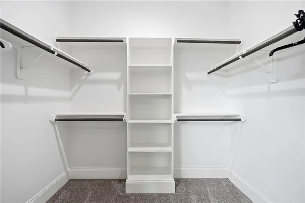 a view of an empty walk in closet