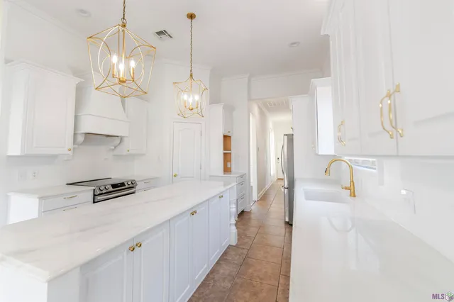 $420,000 | 384 Sugarwood Boulevard, Houma, LA 70360