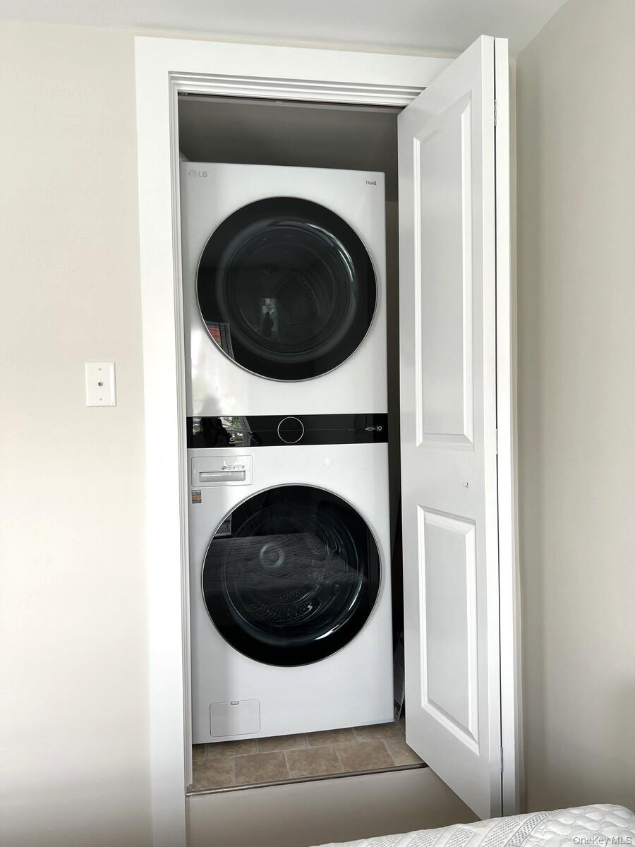 16 South Division Street, Unit 2B Peekskill, NY 10566 - Photo 8 of 8 a utility room with dryer and washer