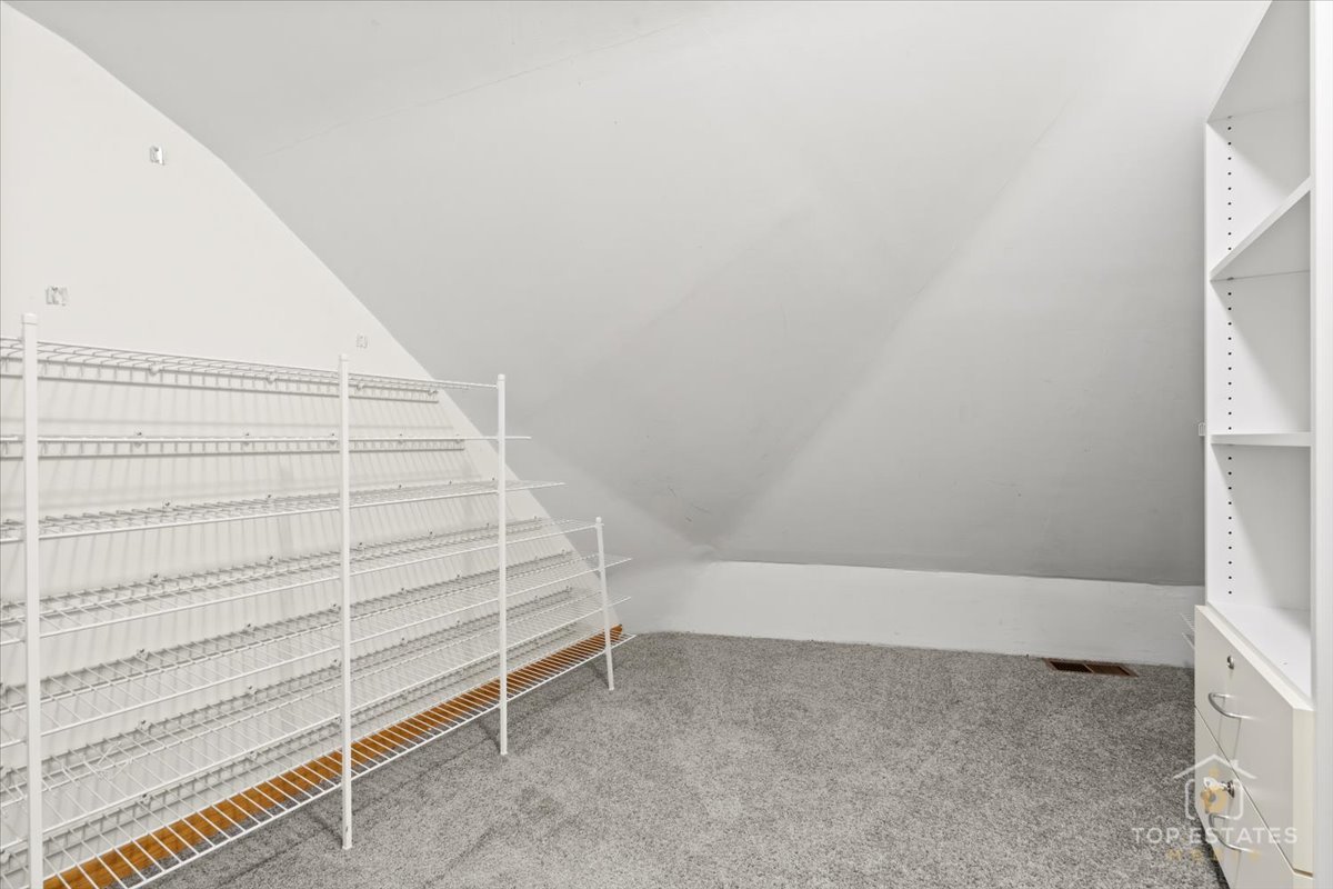 414 Franklin Avenue, Unit 3A River Forest, IL 60305 - Photo 26 of 29 a view of an empty room with a staircase