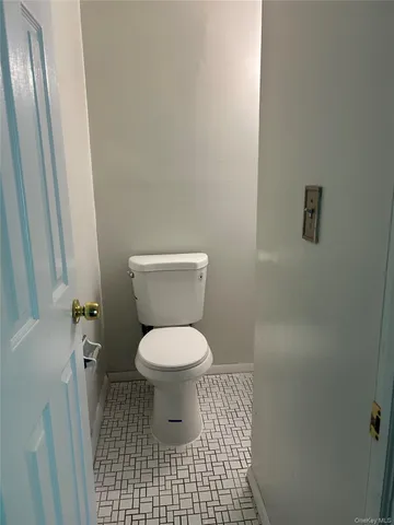a bathroom with a toilet