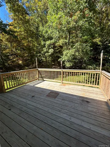 a view of deck that has wooden floor