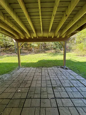 a view of an empty room with a yard
