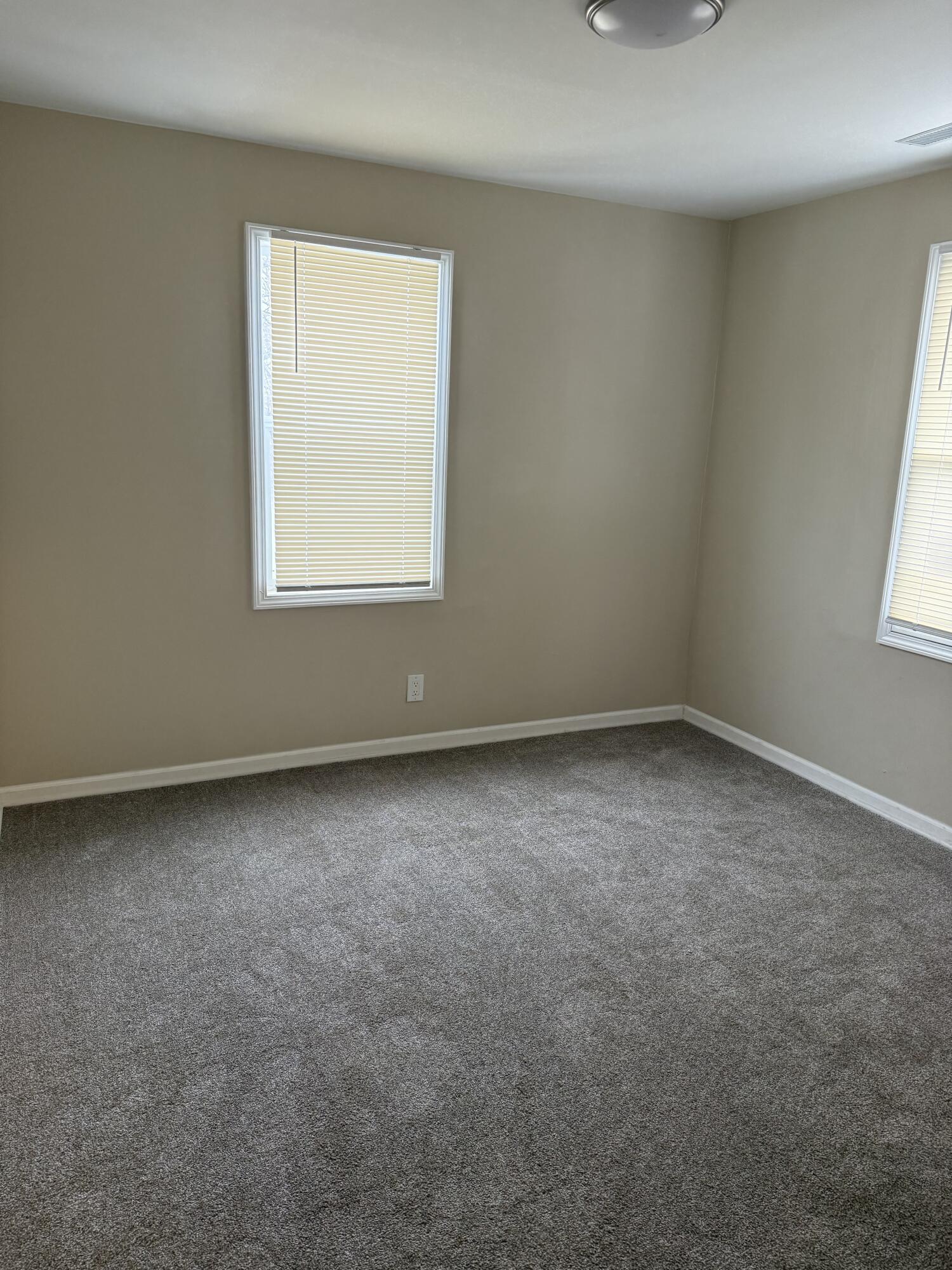 634 Kentucky Street Gary, IN 46402 - Photo 11 of 18 an empty room with a window