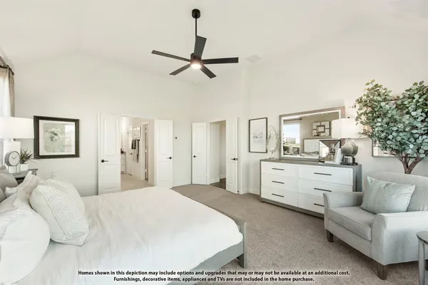 a large white bed in a white bedroom
