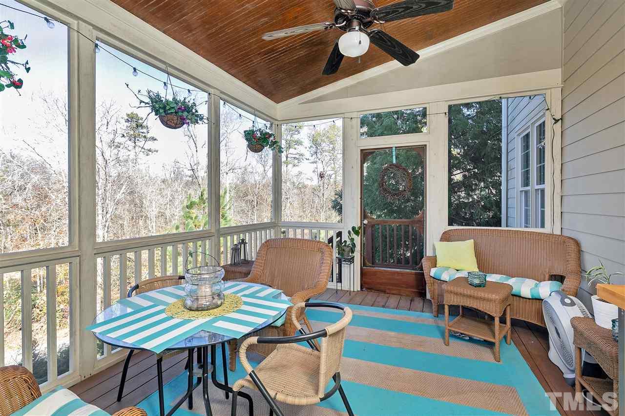 2829 Winter Song Road Raleigh, NC 27614 - Photo 13 of 30 MORE DINING AND SERENITY OUT HERE!!! AMAZING VIEWS!! STAIRS DOWN TO PATIO AND BACK YARD.