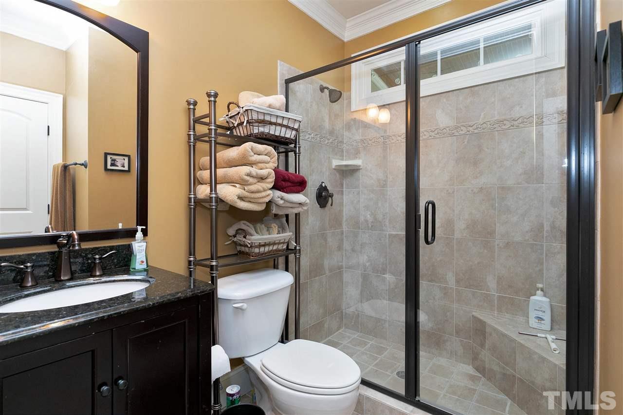 2829 Winter Song Road Raleigh, NC 27614 - Photo 17 of 30 FULL BATH FOR GUESTS AND MAIN FLOOR BEDROOM. FEATURES GRANITE AND BEAUTIFUL TILE! ALL 5 BATHROOMS HAVE GRANITE AND TILE. THEY LOOK BRAND NEW!!