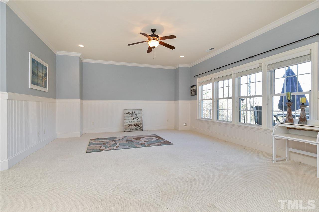 2829 Winter Song Road Raleigh, NC 27614 - Photo 27 of 30 BEADBOARD WAINSCOTING THROUGHOUT. LEADS TO BATH, BEDROOM AND 3 LARGE STORAGE ROOMS!