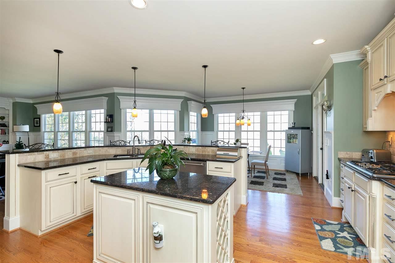 2829 Winter Song Road Raleigh, NC 27614 - Photo 9 of 30 JUST CAN'T GET ENOUGH OF THIS KITCHEN W/OPEN CONCEPT!! EVERYONE WANTS TO BE NEAR THE HOST WHILE ENTERTAINING... AND HERE, THERE IS SPACE FOR THAT.... so the host doesn't feel stressed and crowded....