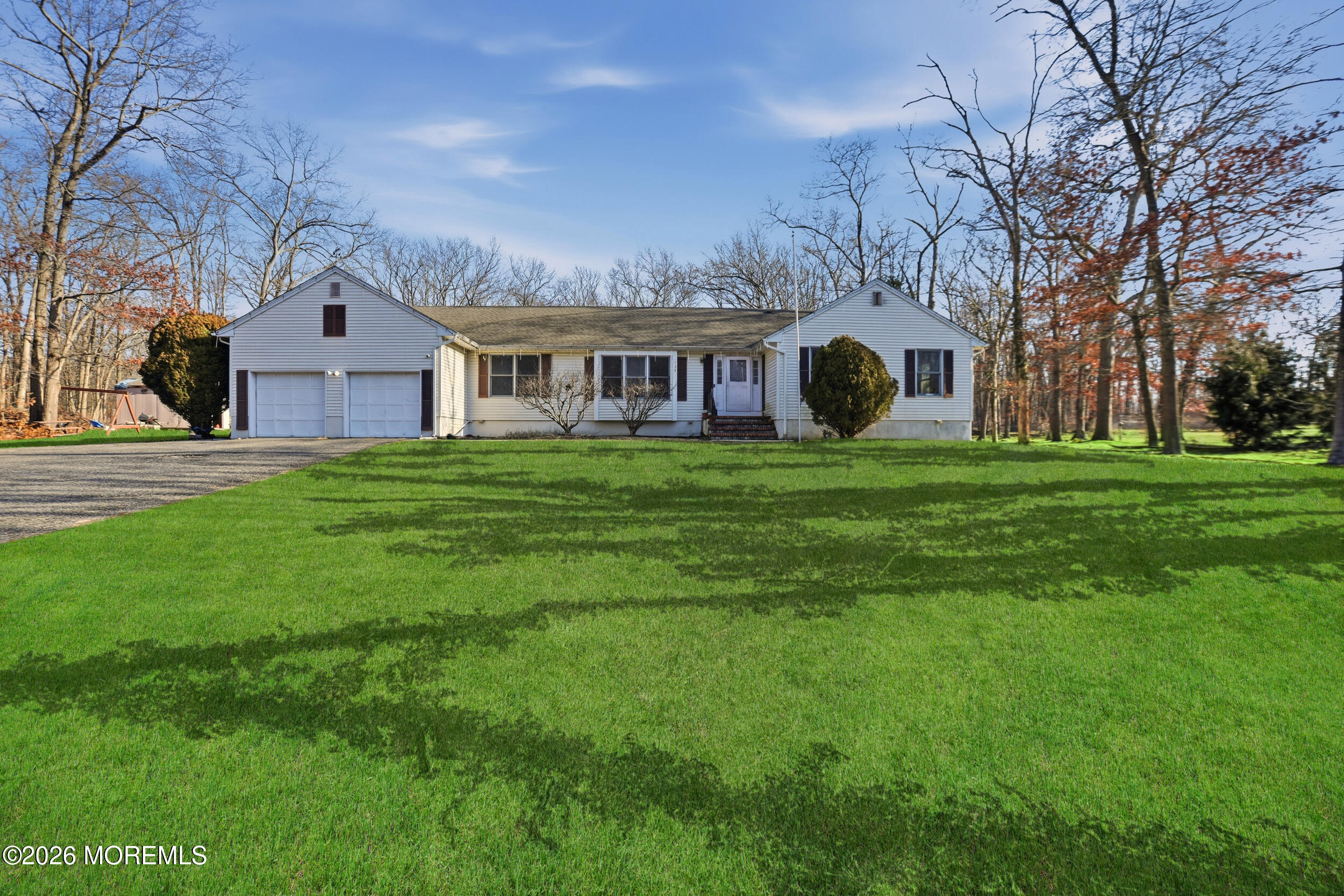 153 South Hope Chapel Road Jackson, NJ 08527 - Photo 2 of 10 a front view of house with yard and green space
