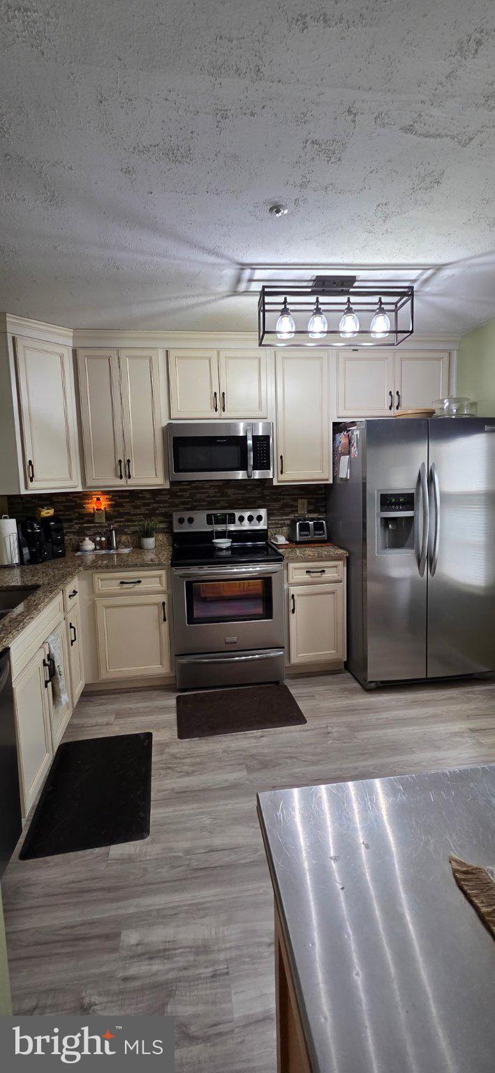 102 Jason's Ridge Smithsburg, MD 21783 - Photo 14 of 31 Modern kitchen with sleek finishes.
